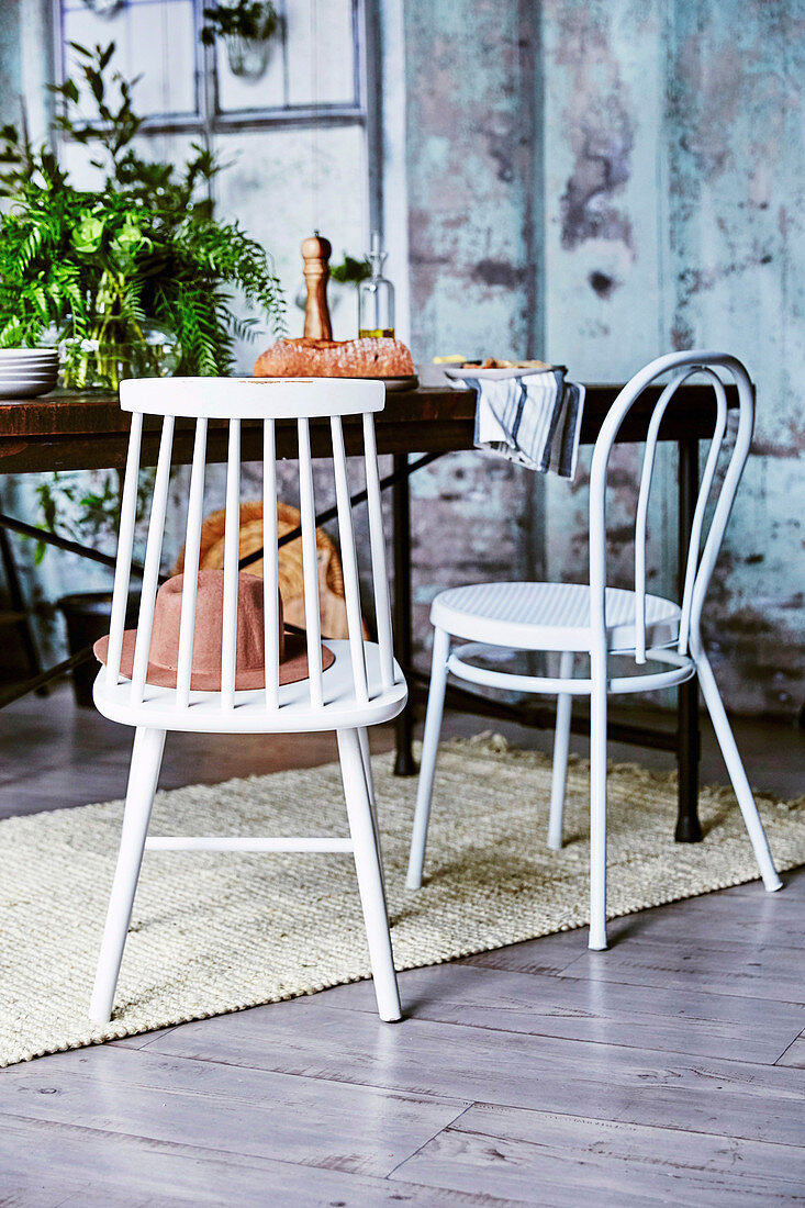 Different chairs at the dining table