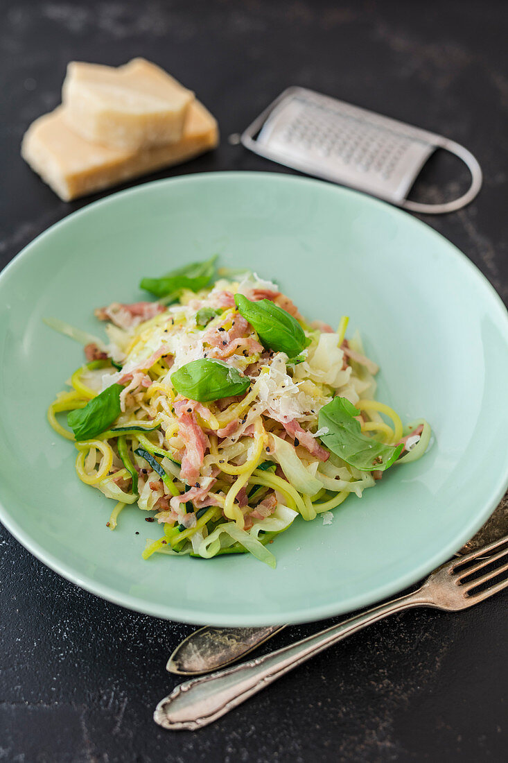 Courgette and pointed cabbage with bacon, basil and Parmesan