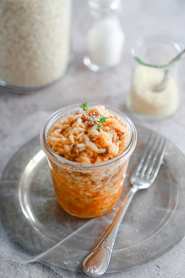 Risotto with ragout served in a glass