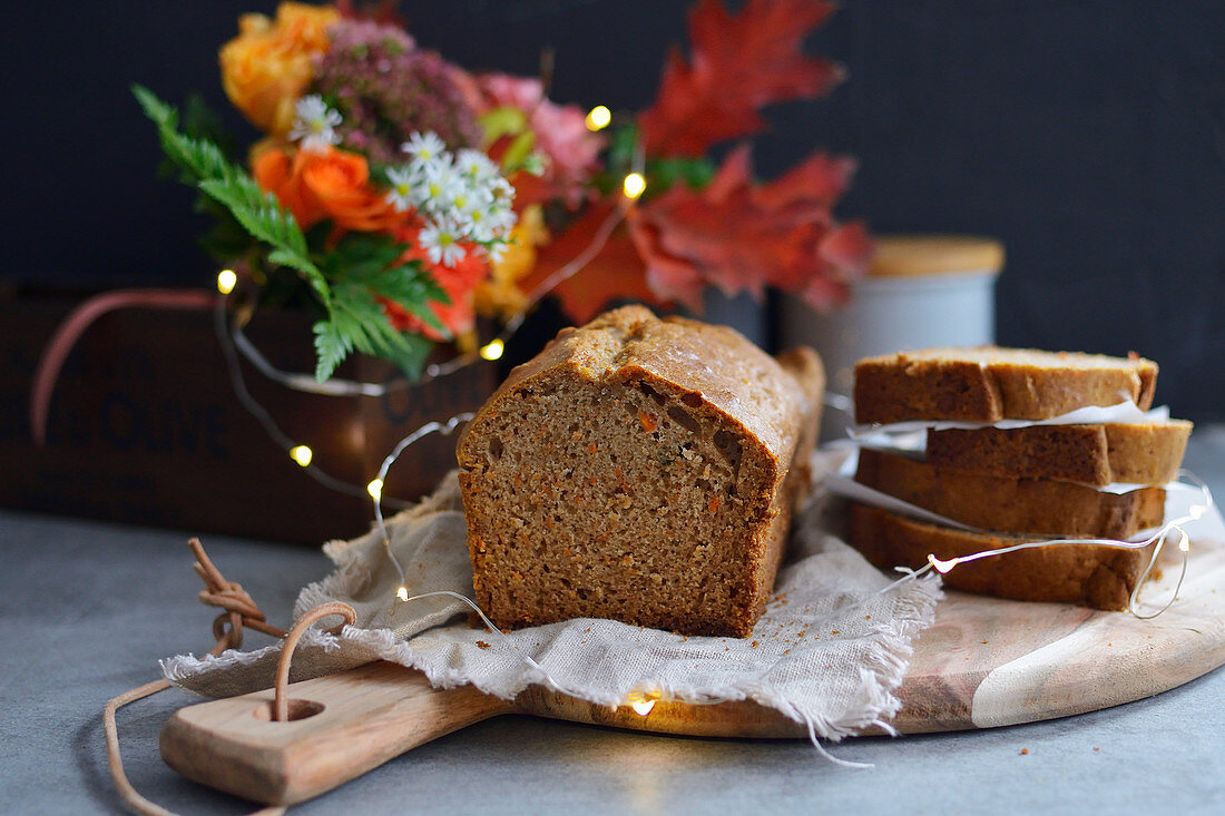 Autumnal carrot cake in a loaf tin, sliced