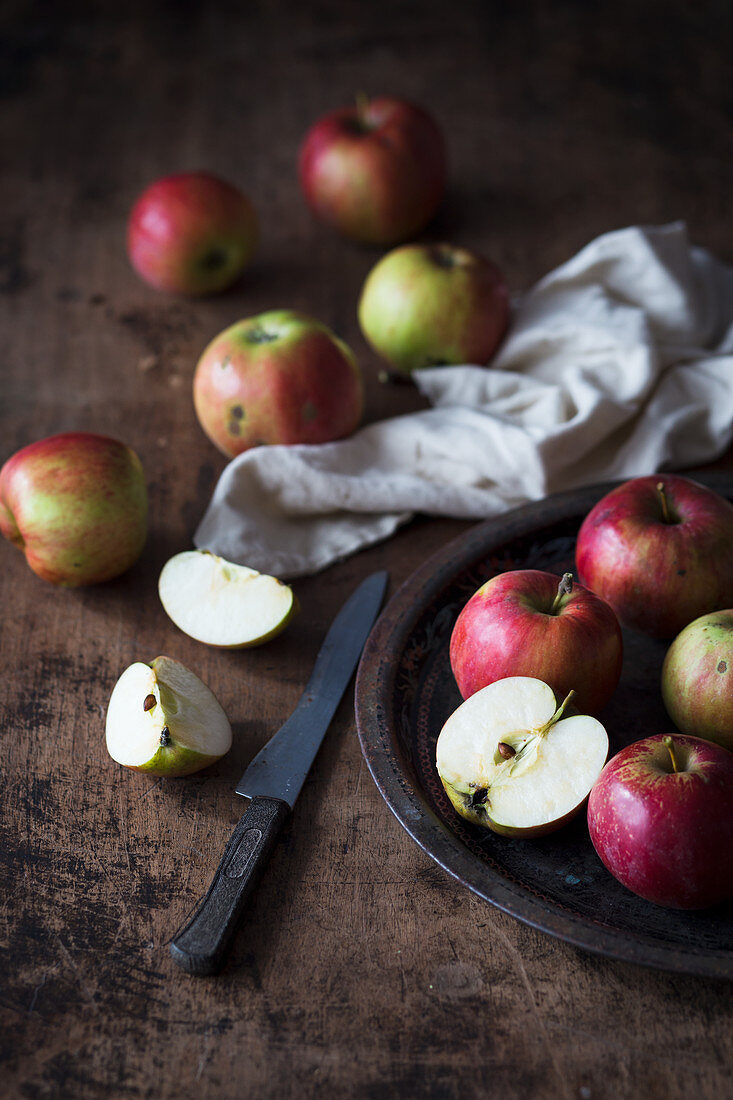 Apples on a dark wooden surface