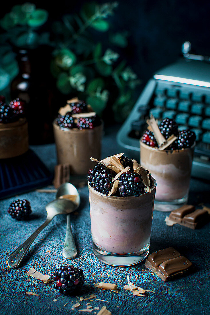 Chocolate and blackberry mousse in glasses