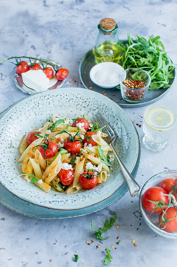 Penne with tomatoes and rocket