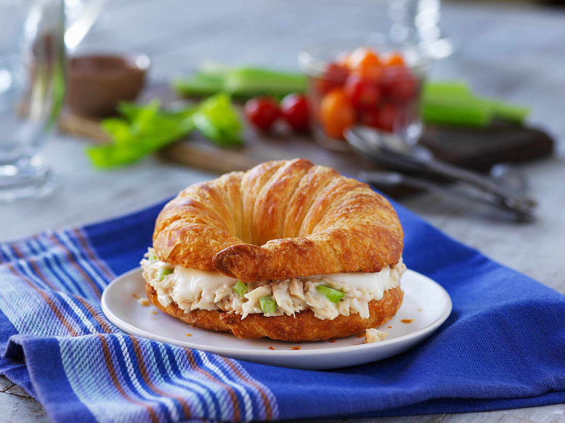 A croissant filled with tuna salad
