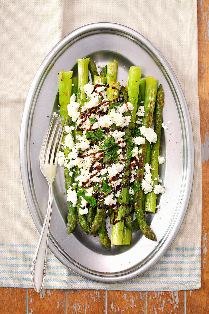 Grilled green asparagus with feta