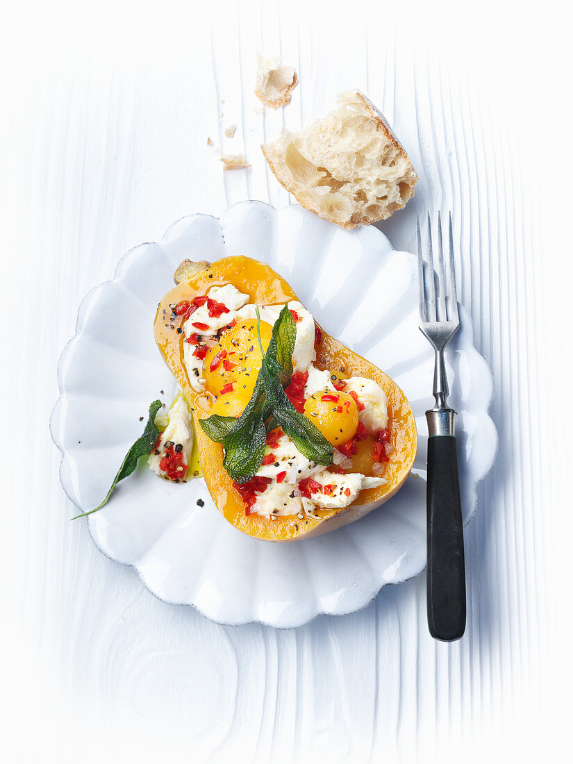 Pumpkin salad with mozzarella cheese, chilli peppers and sage
