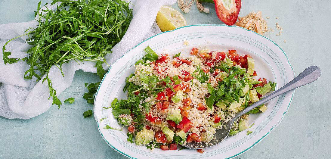 Couscous salad with avocado, rocket and pepper