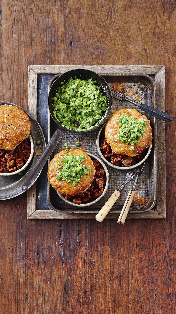 Lamb and red wine pies with mushy peas