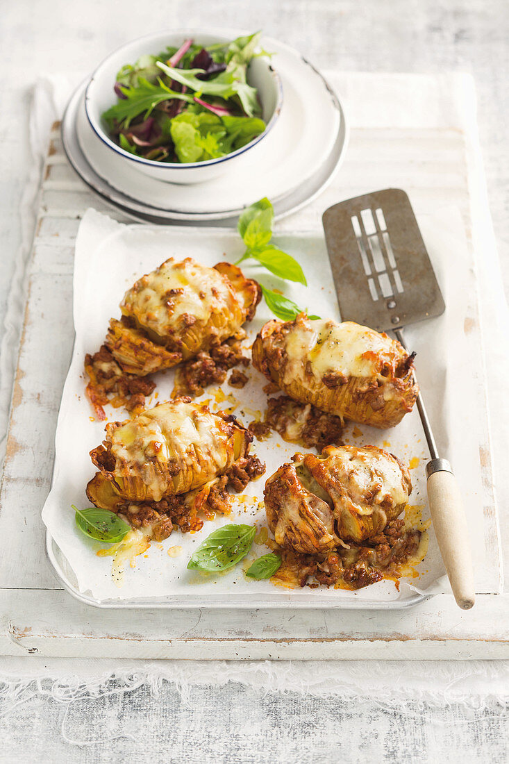Hasselback potatoes with bolognese sauce