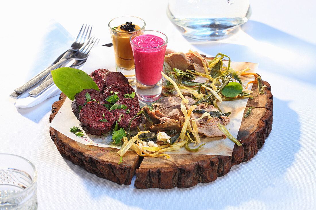 A meat platter with sauces (Ukraine)