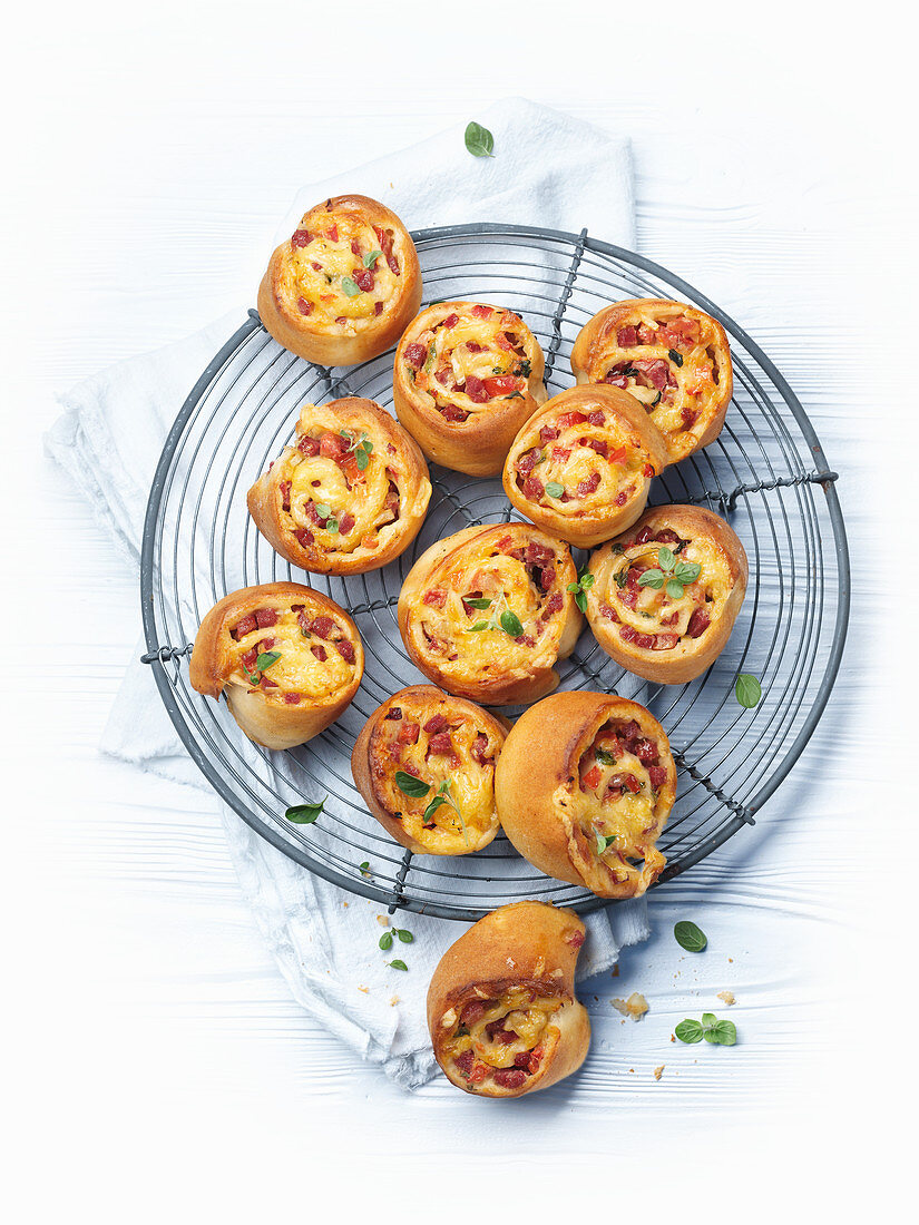 Pizza snails on a cooling rack