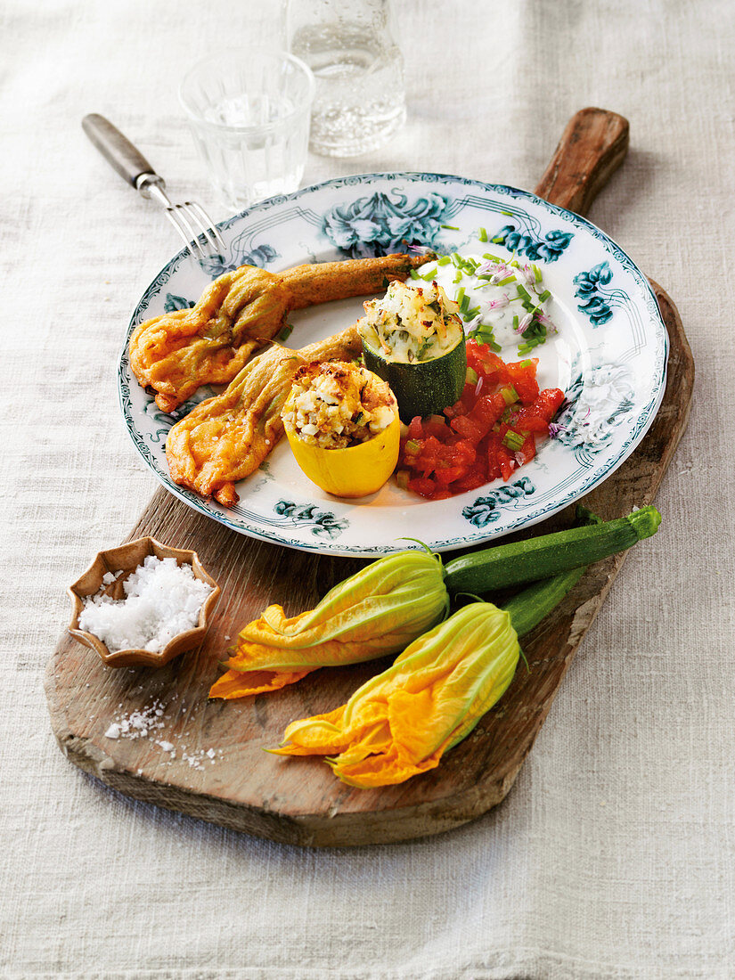 A trio of stuffed courgettes and courgette flowers