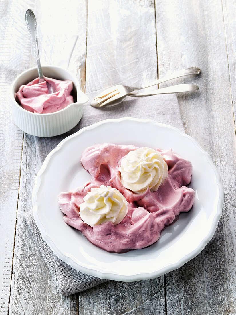 Yoghurt ice cream on elderberry foam