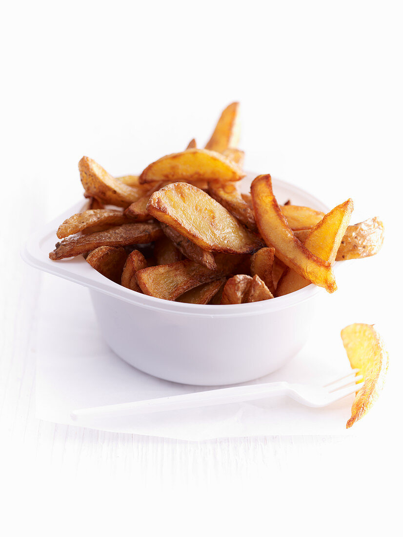 Fried potato wedges