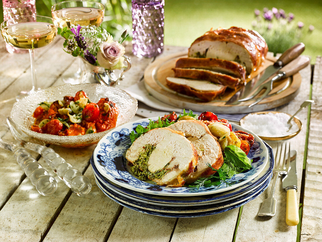 Stuffed chicken with a roast tomato salad