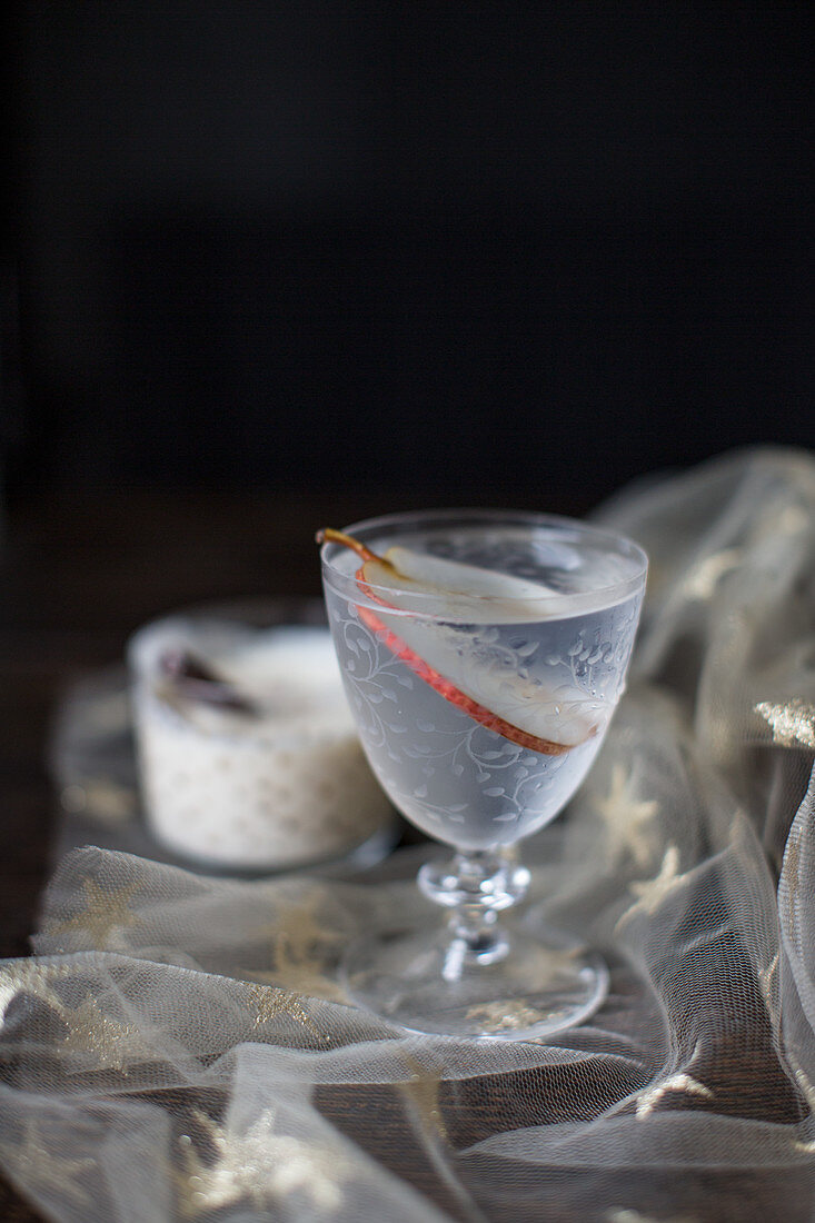 Two Christmas cocktails on a starry cloth