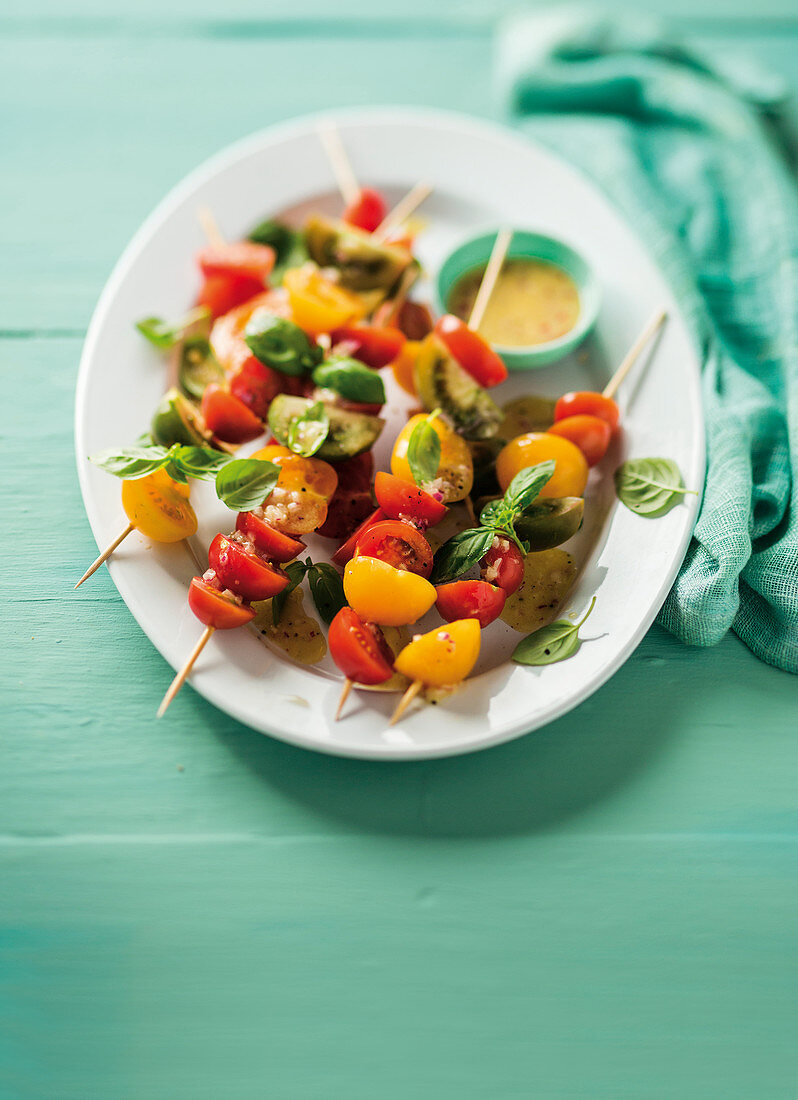 Mixed tomato salad on skewers