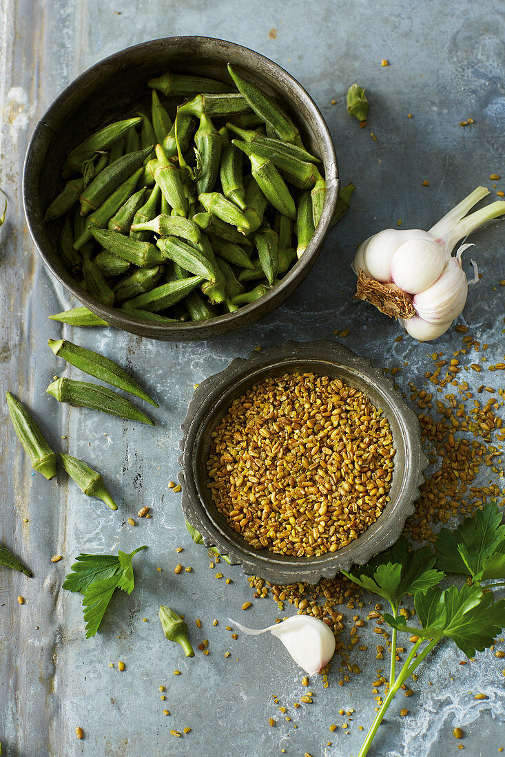 Bowls of okra pods and freekeh