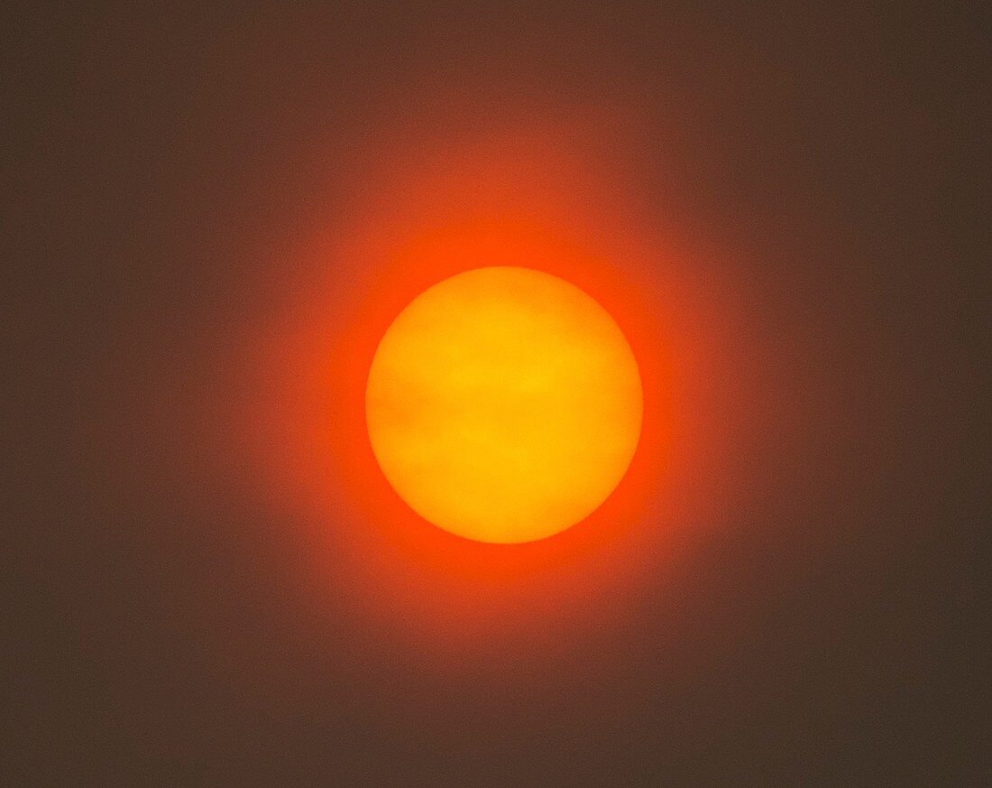 Red Sun caused by atmospheric dust