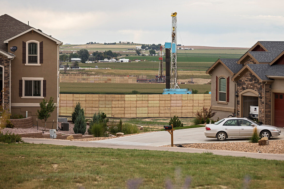Fracking site near homes, Colorado, USA