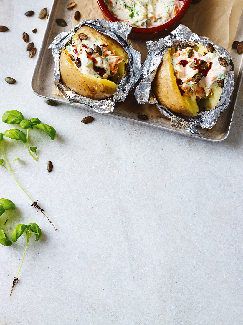Baked potatoes filled with quark and pumpkin seeds