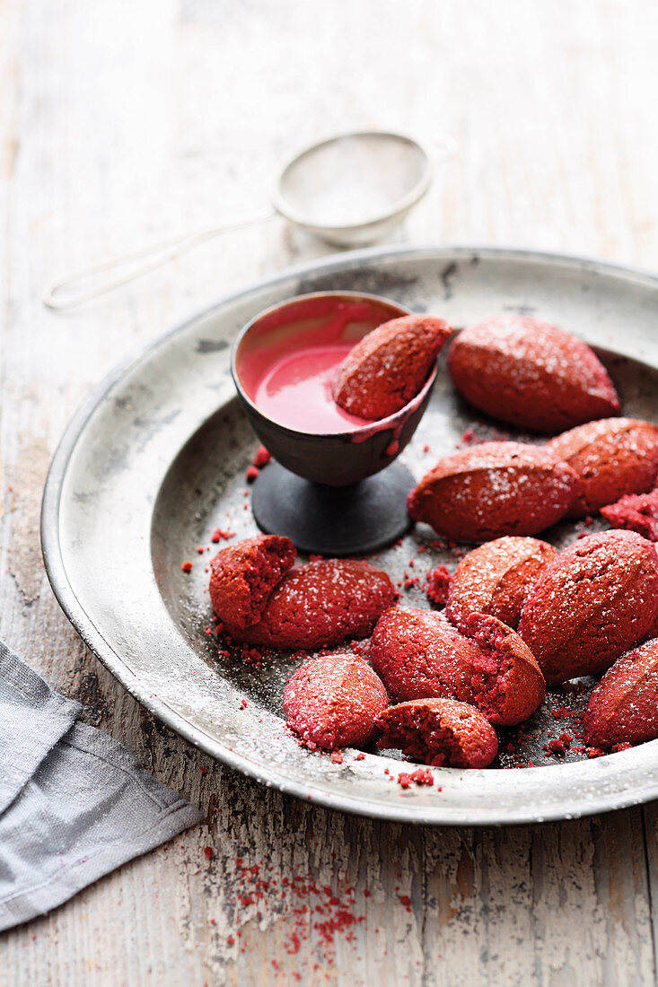 Grilled pink sweets-style doughnuts with a raspberry yoghurt sauce