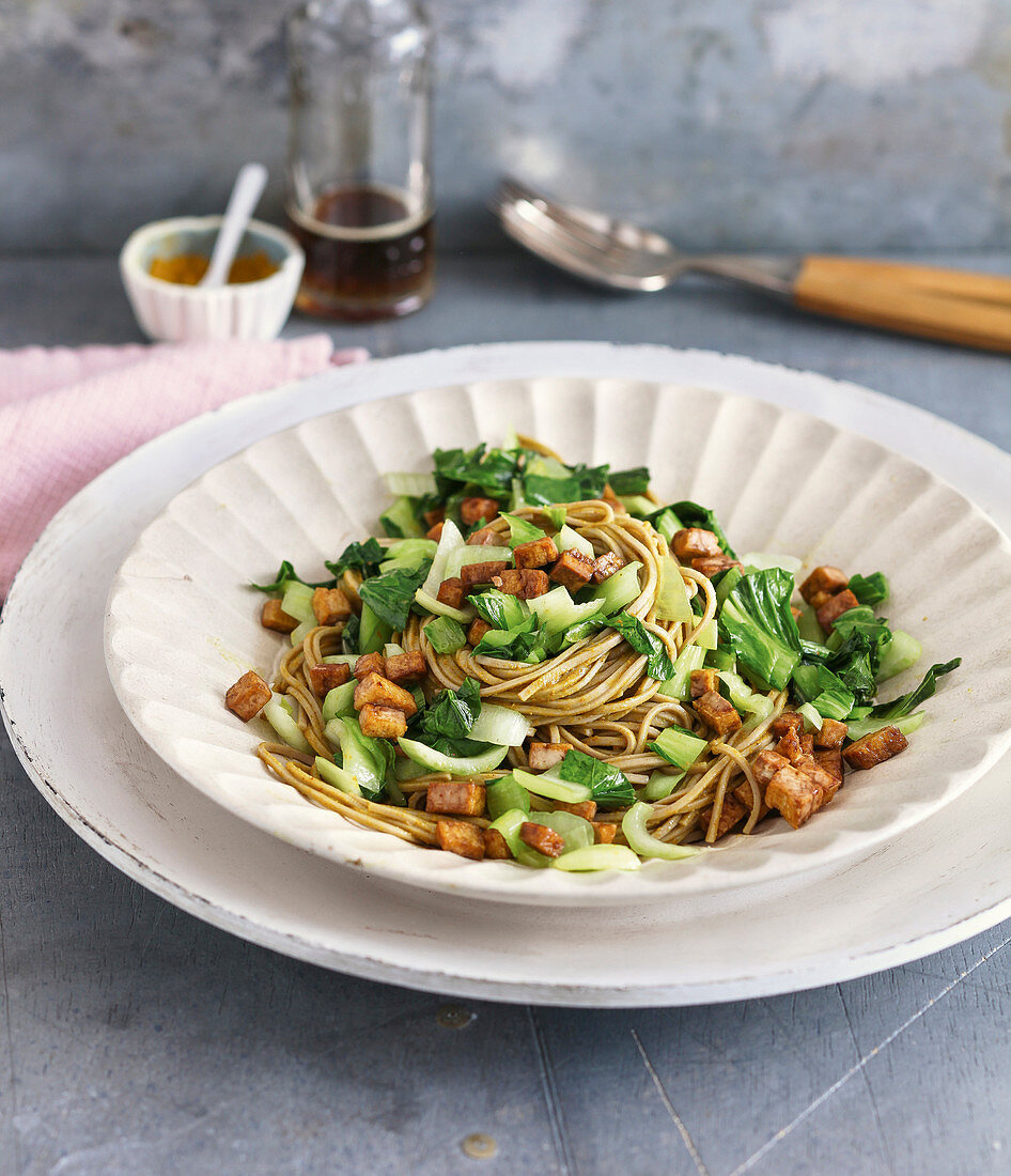 Curried noodles with bok choy and fried tofu