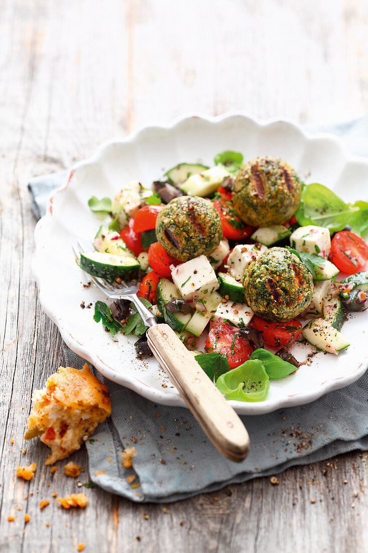 Grilled chickpea balls with a country salad