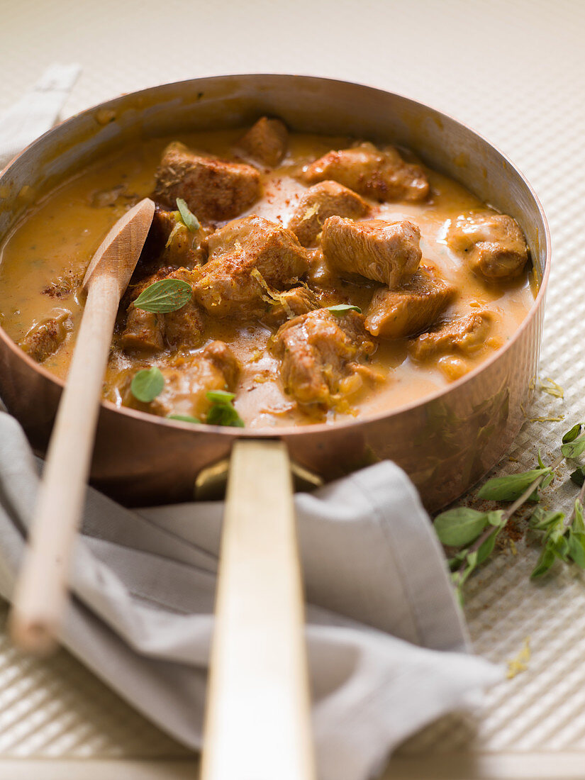 Veal and cream goulash with potato cubes