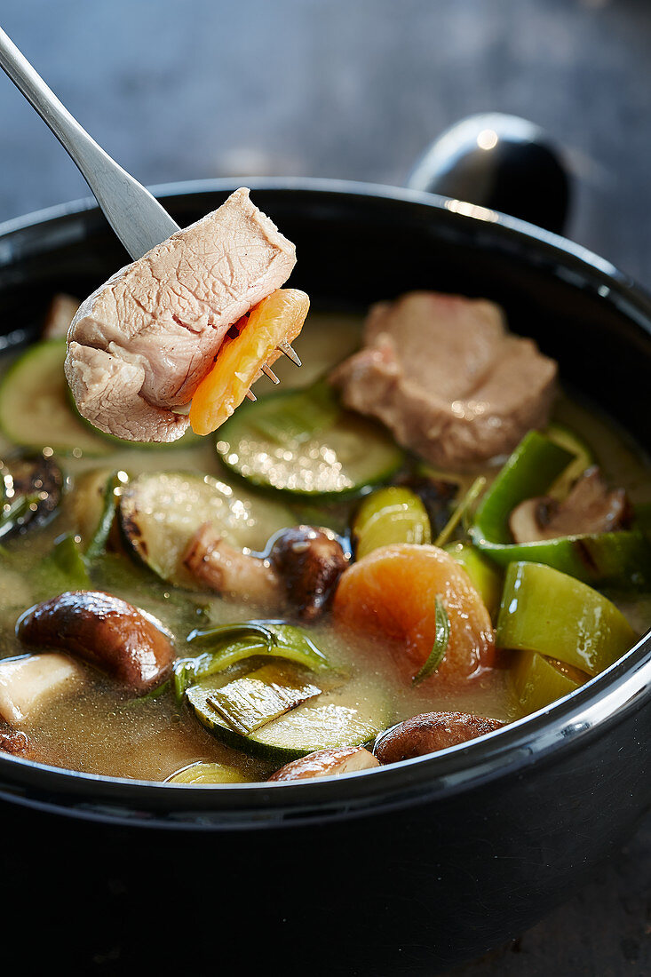 Pork fillet with vegetable broth fondue