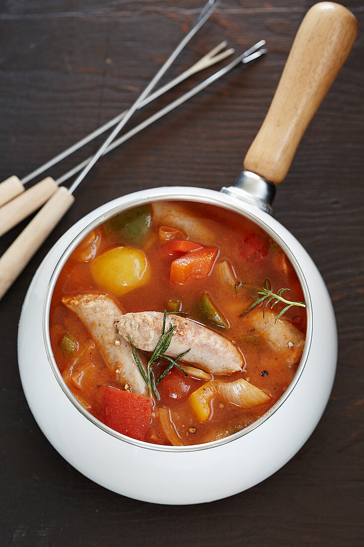 Hungarian pepper fondue with sausage