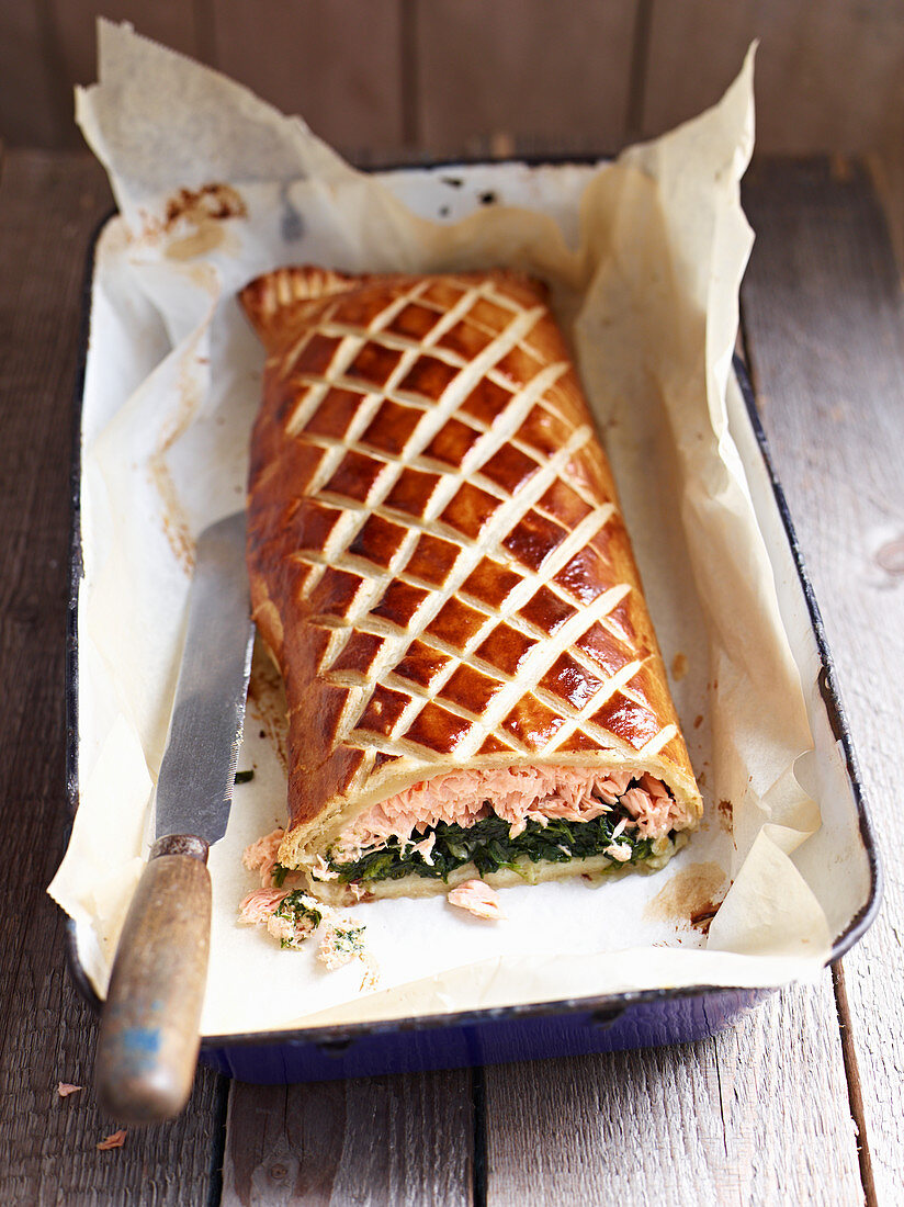 Spinach and salmon strudel, sliced