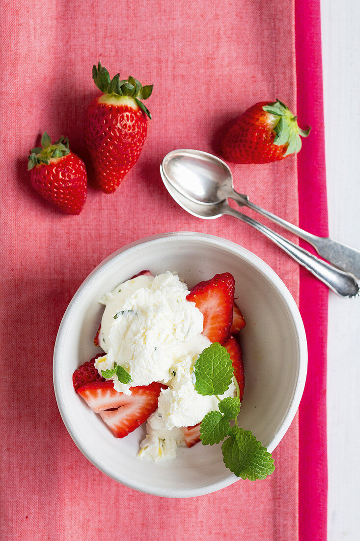 Lime and honey ice cream with strawberries