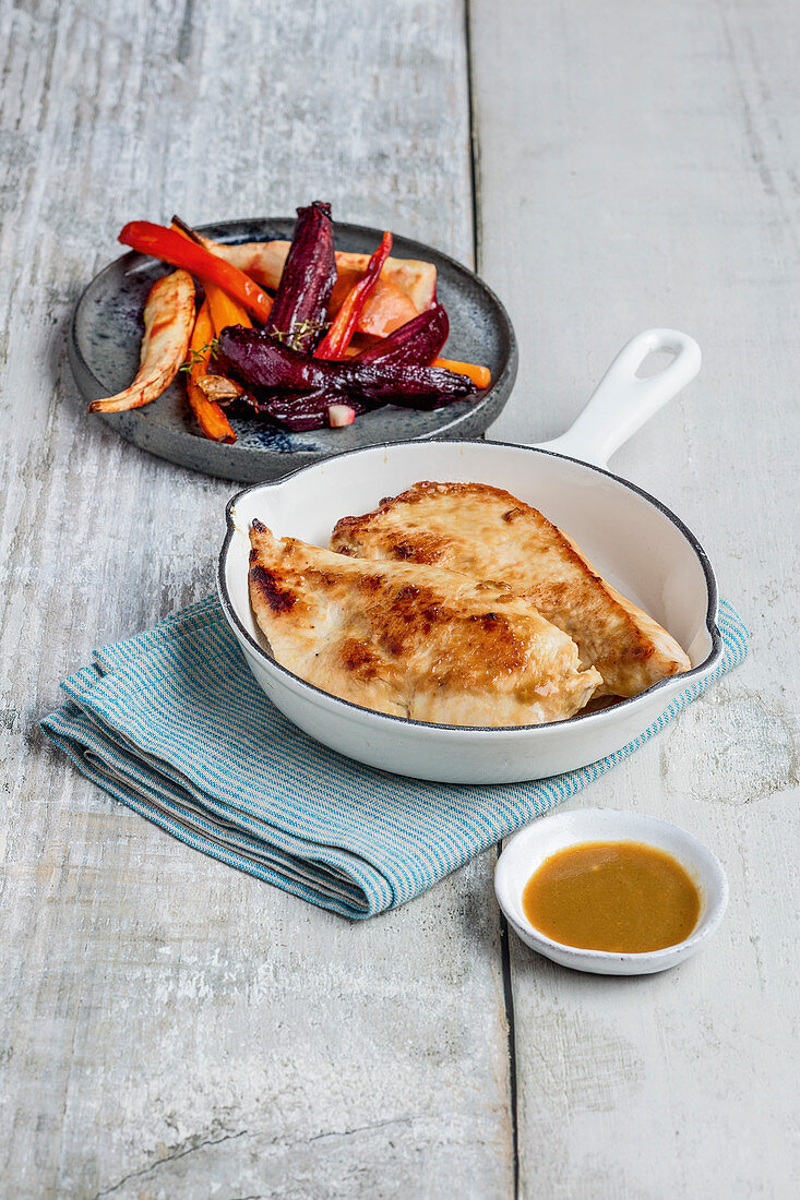 Marinated chicken breast with oven-roasted vegetables