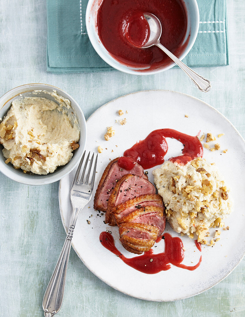 Roast duck breast with celery puree and plum sauce