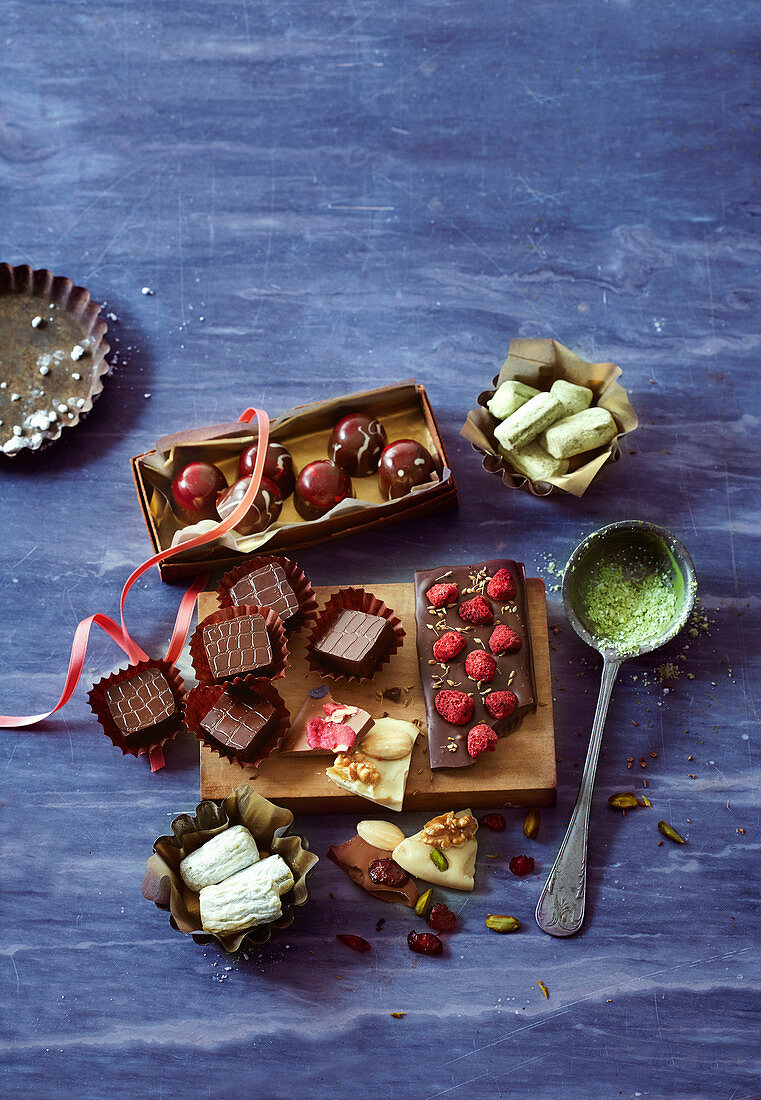 A selection of pralines and broken chocolate