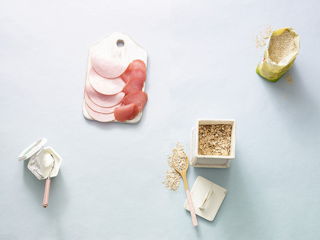 Breakfast ingredients – ham, cream cheese, cereal and porridge