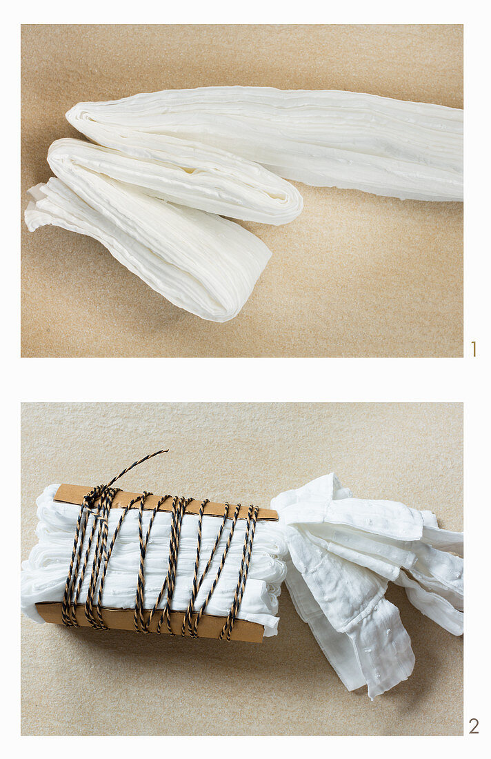 Preparations for dying a curtain using the Shibori technique: fix with thick cardboard and wrap with cord