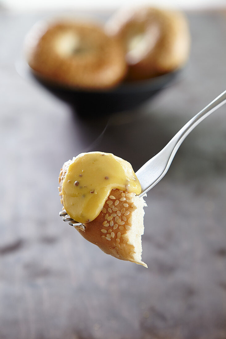 Rarefit fondue with bagels on a fondue fork