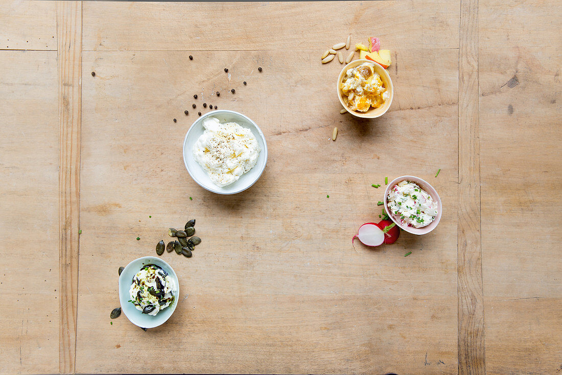 Cream cheese four ways – with mango, curry, pumpkin seeds and radishes