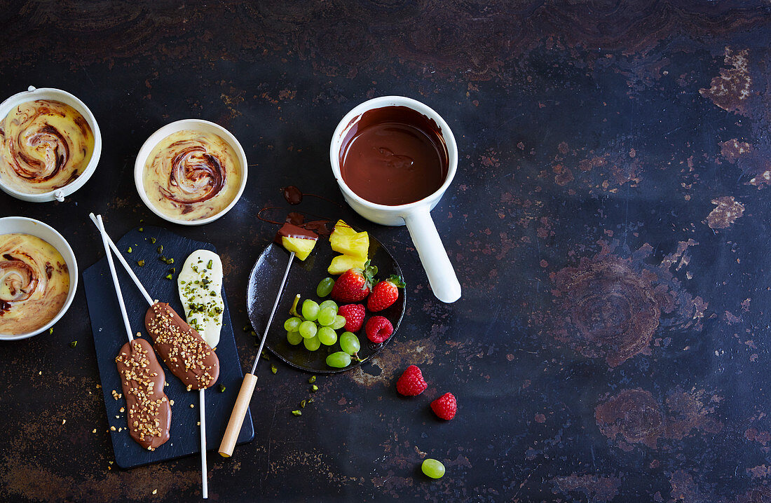 Chocolate fruits, praline pudding and chocolate lollies