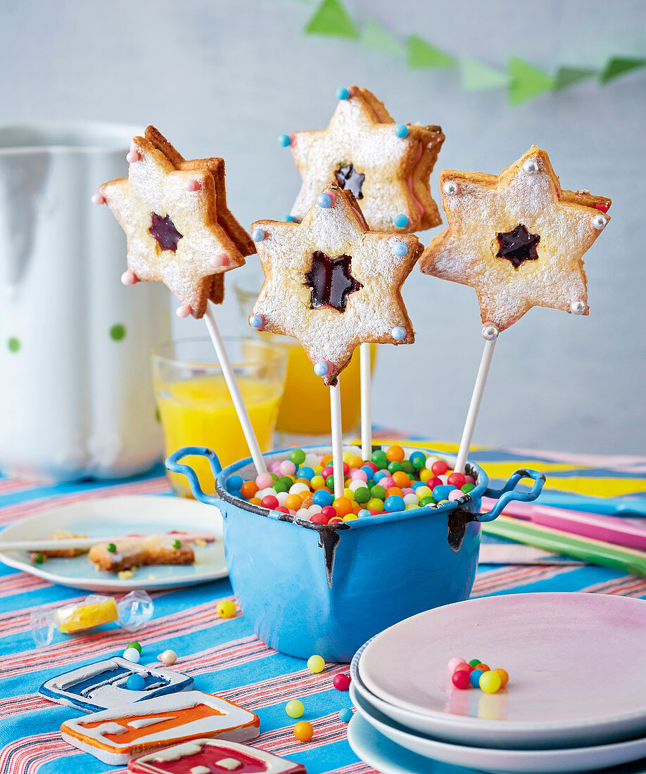 Magic wand lollies made from biscuit stars
