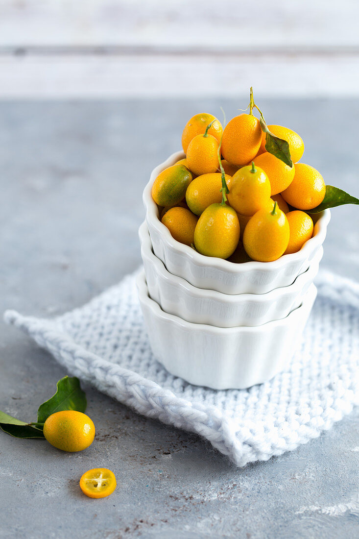 Kumquats in a white bowl