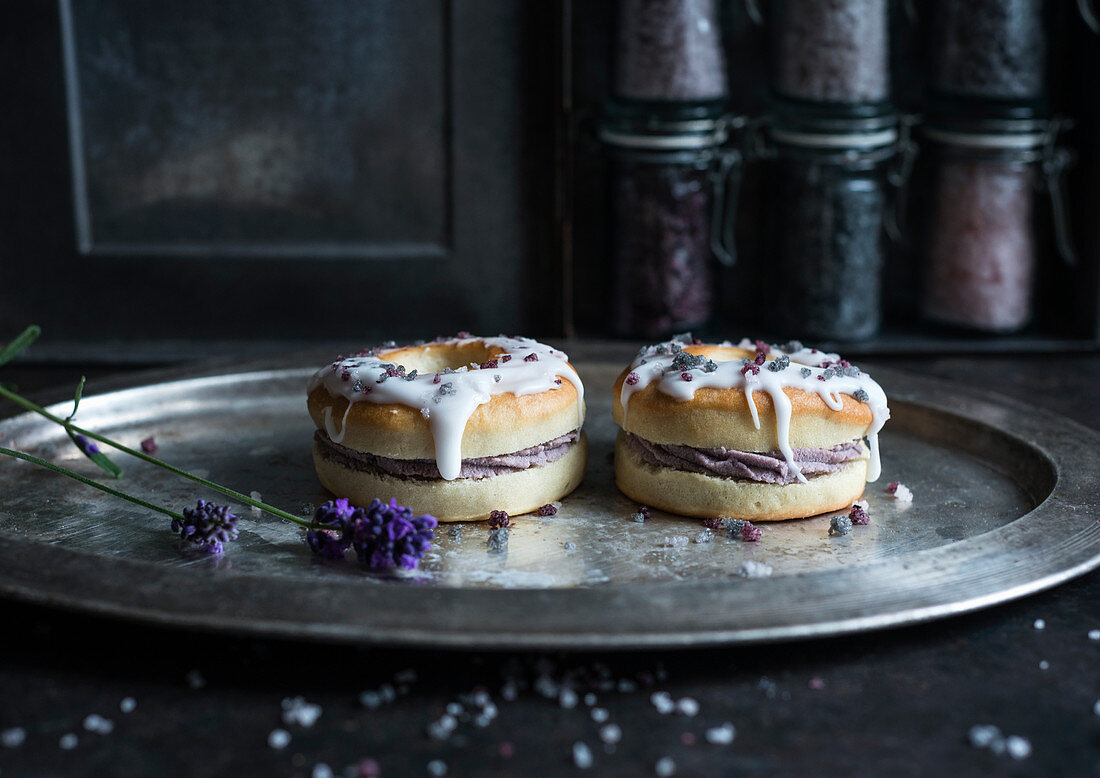 Vegan, oven-baked doughnuts with lavender cream and icing