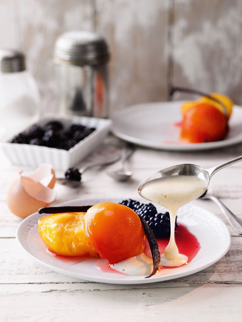 Vanilla peaches with sabayon and marinated blackberries