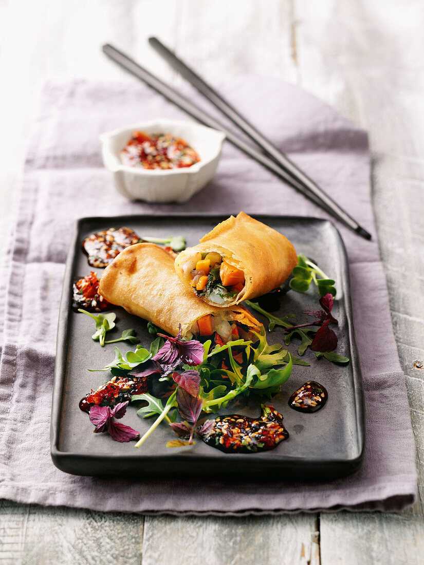 Prawn and Chinese cabbage spring rolls with a curry and chilli vinaigrette