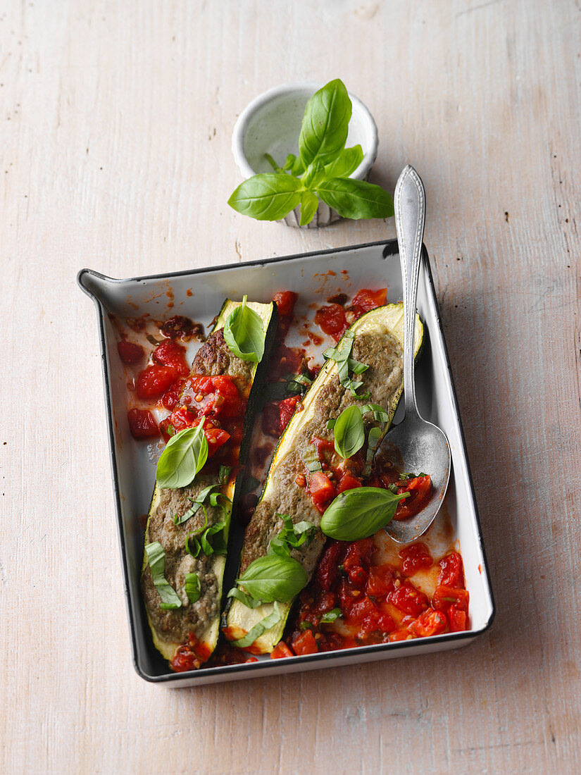 Oven-baked courgette filled with basil and silken tofu