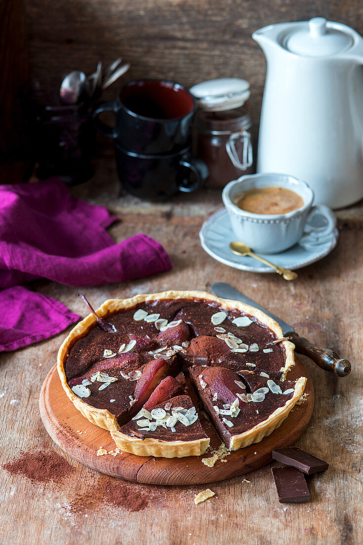 Chocolate tart with poached red wine pears