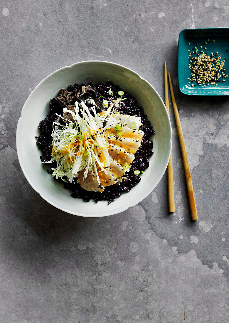 Black and white kingfish poke bowl with black rice and Miso dressing
