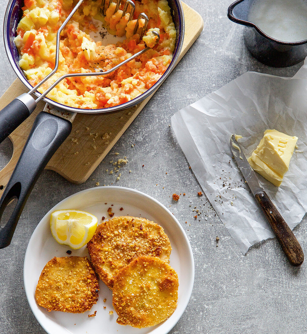 Celeriac escalopes with mashed potatoes and carrots
